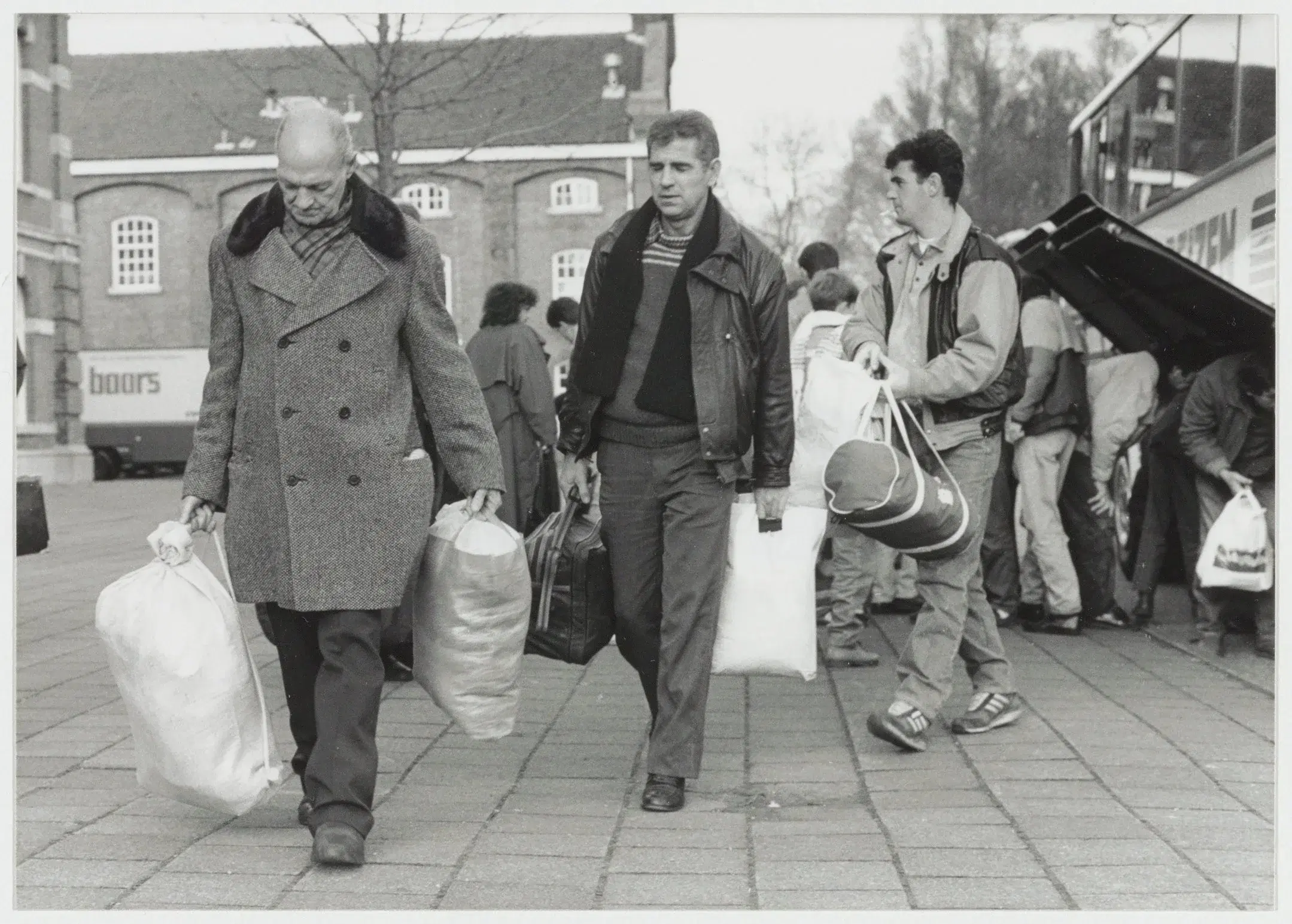 Bosnian refugees arriving with their belongings at an asylum centre in Haarlem in December 1992.