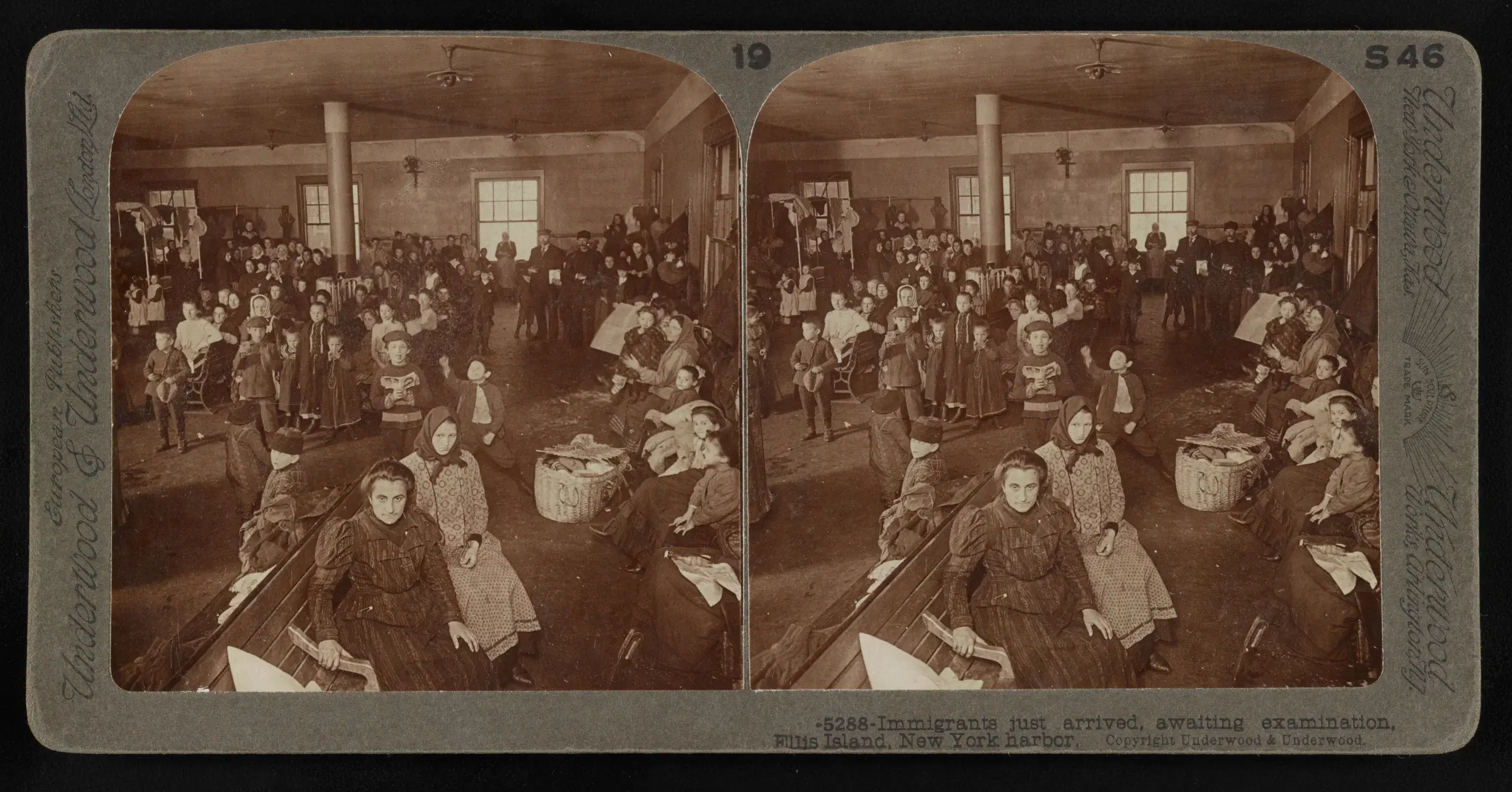 Stereoscopic photograph of immigrants awaiting examination inside Ellis Island.