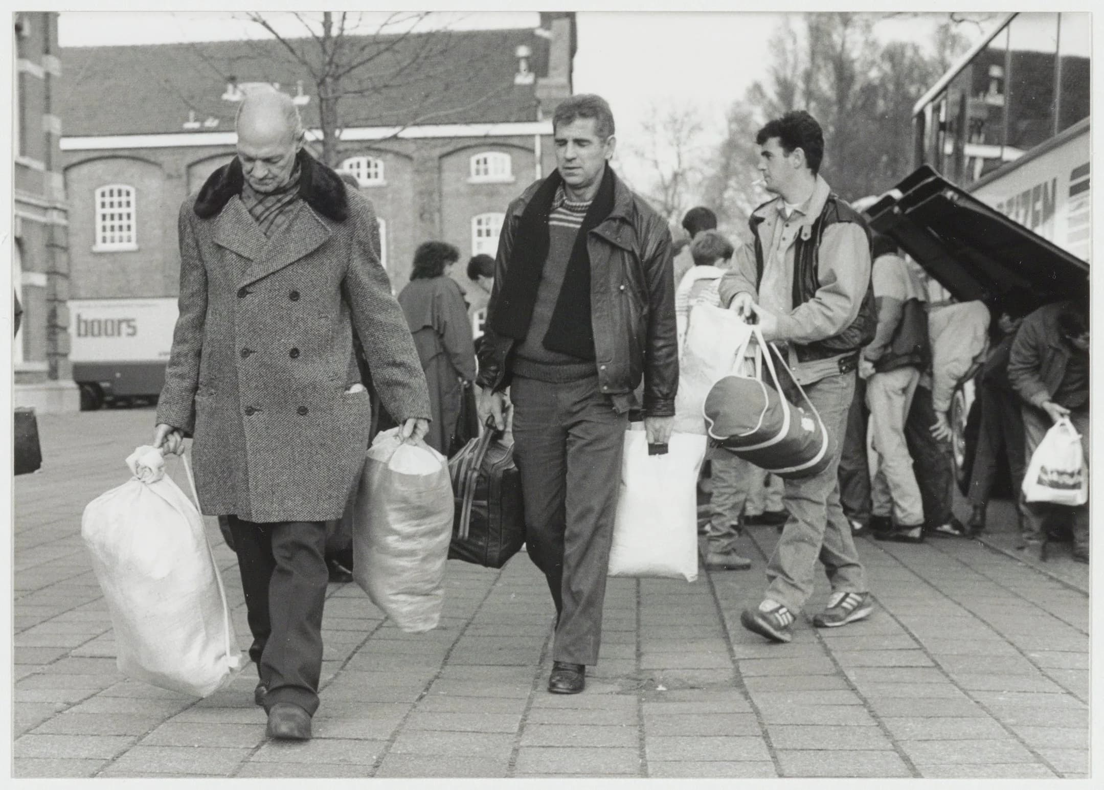 Bosnian refugees arriving with their belongings at an asylum centre in Haarlem in December 1992.